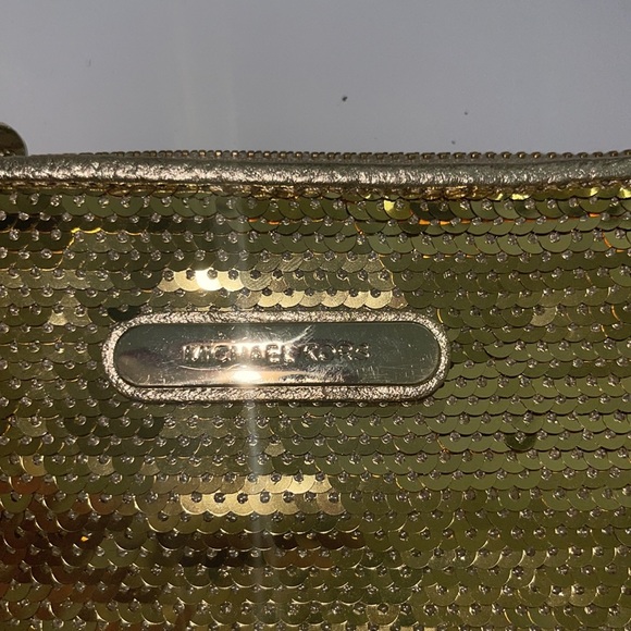Gold Michael Kor’s wristlet. - Picture 2 of 6